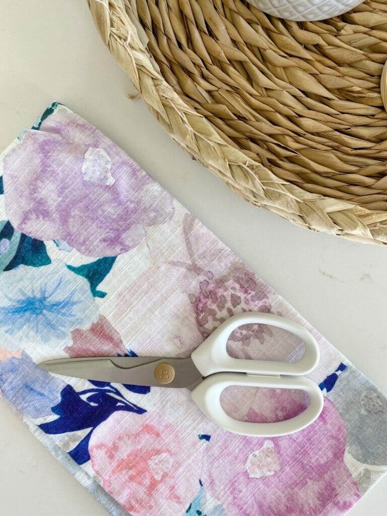 flat lay of hyacinth tray and white kitchen shears