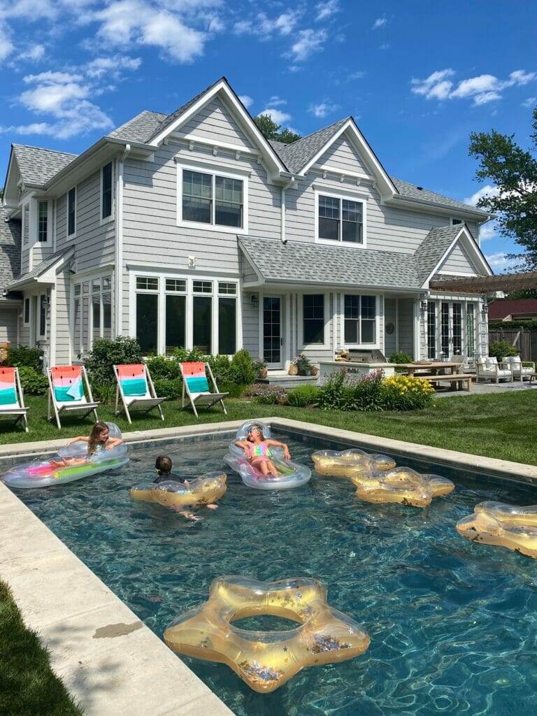Backyard pool features pebble sheen finish in ocean blue. Making the Most of Summer with Walmart+