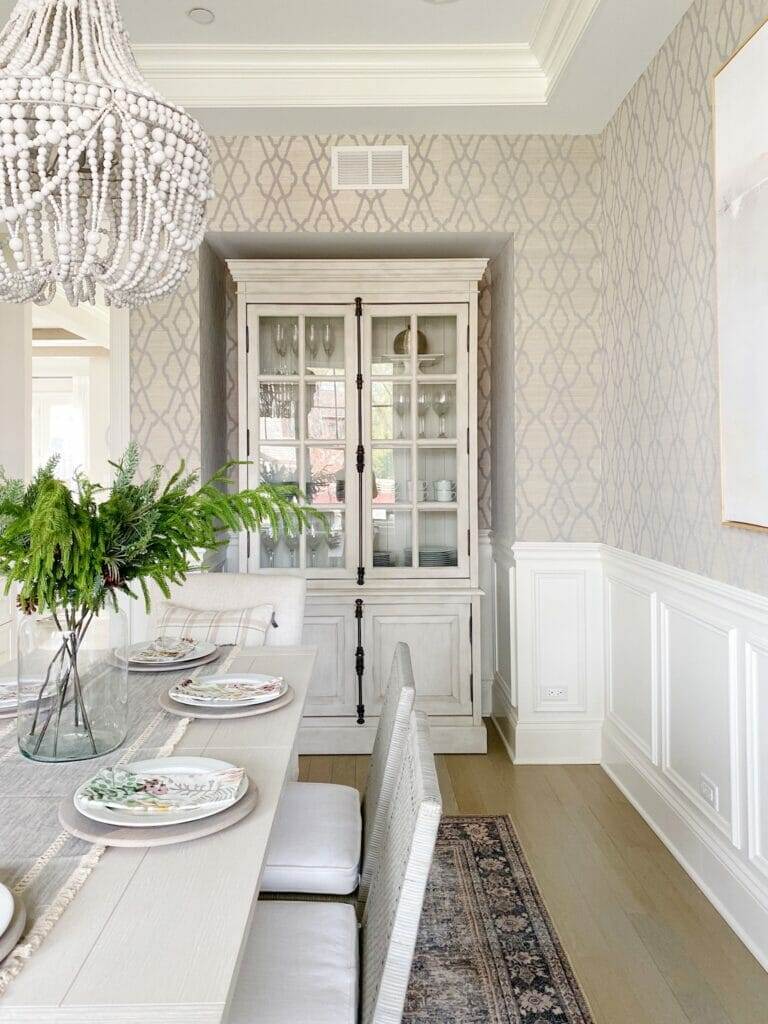 dining room table dining room update featuring Serena & Lily Beach House dining table and Balboa side chairs, beaded chandelier, and loloi rug