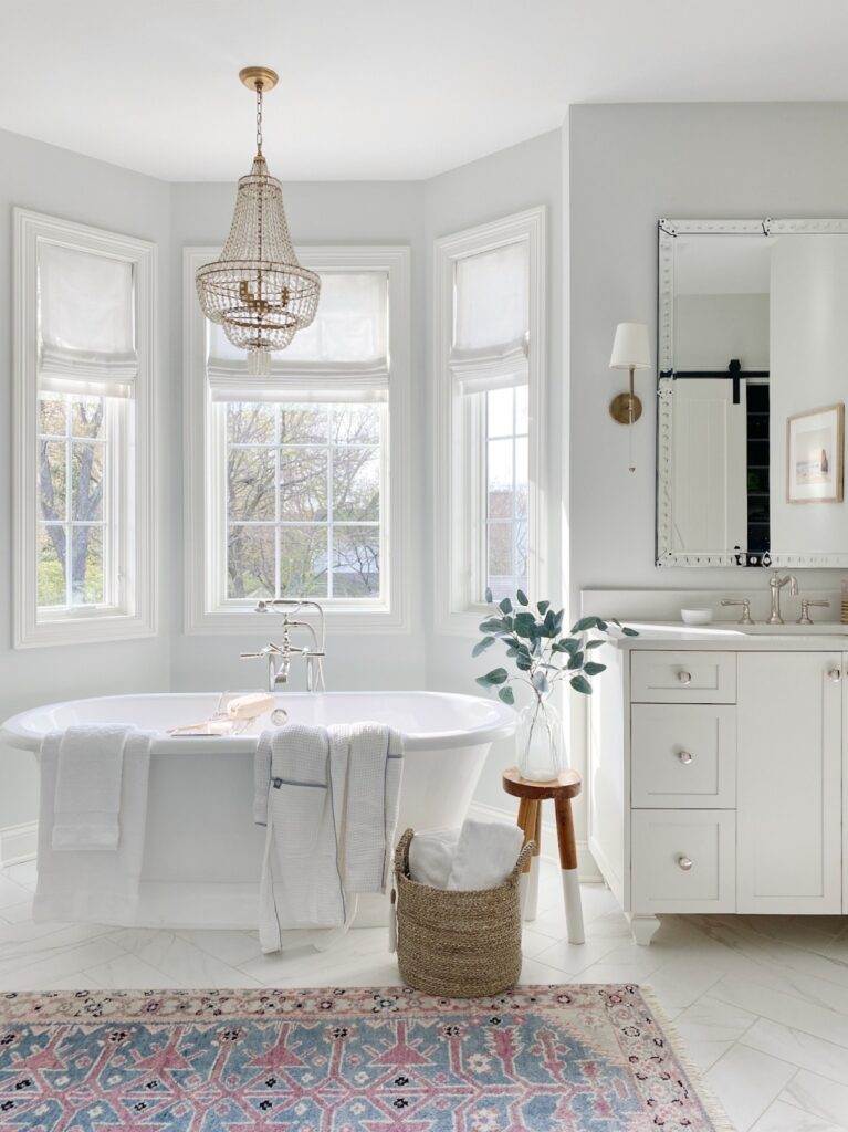bathroom tub and vanity with mirror